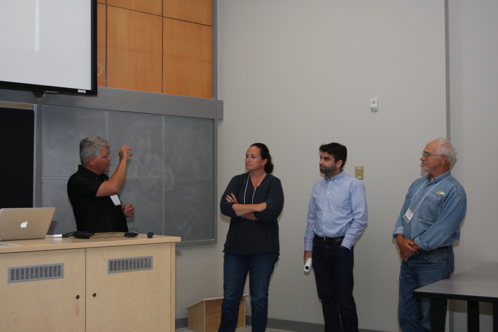 Muskies Canada Inc. members talking with Jennifer Lamoreaux (RVCA) and a representative of the local developer at the International Muskellunge Symposium held at Carleton University.